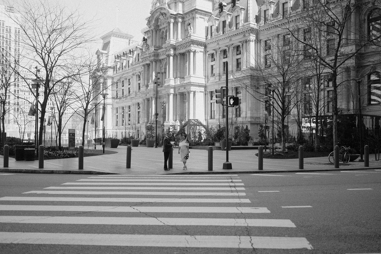 Black and white photo of a couple posing in downtown Philly