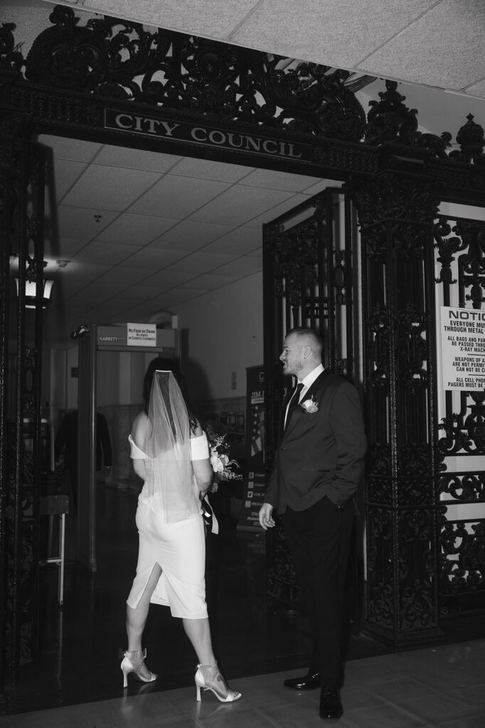 Black and white candid Philadelphia City Hall wedding photos