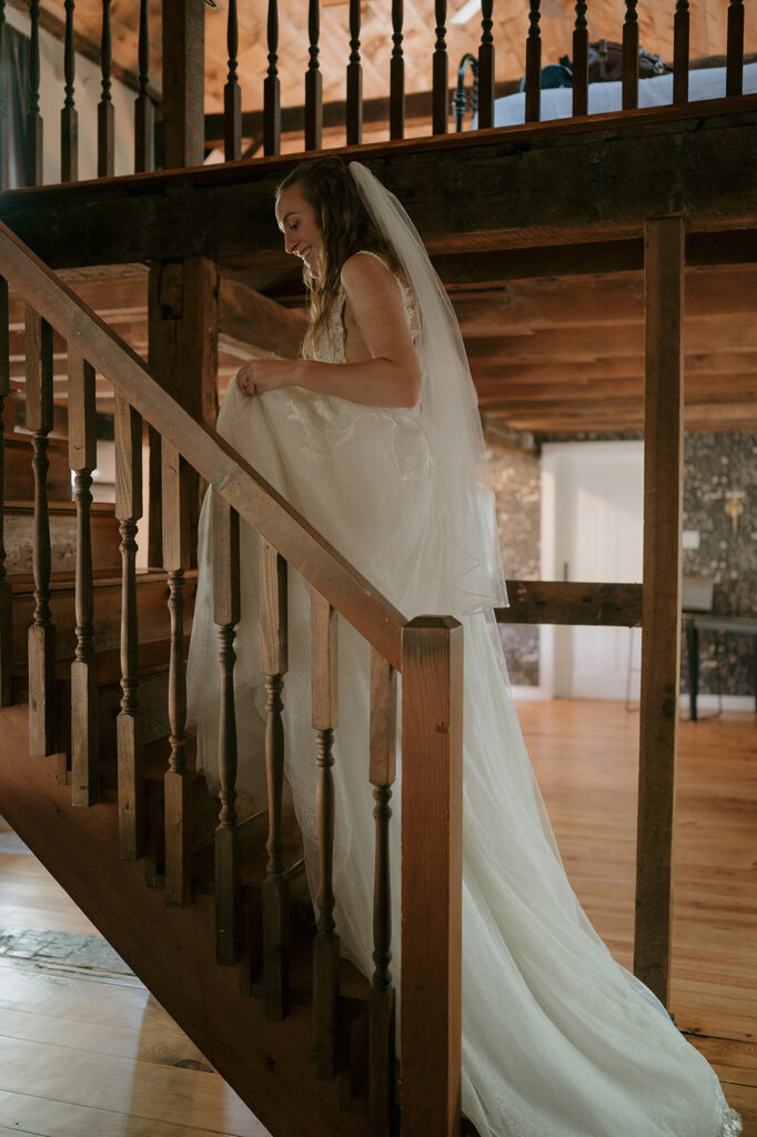 Bride walking up a staircase