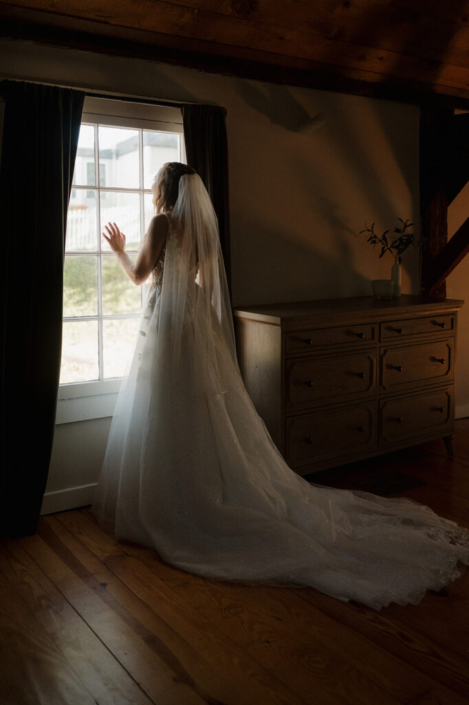Bride looking out the window