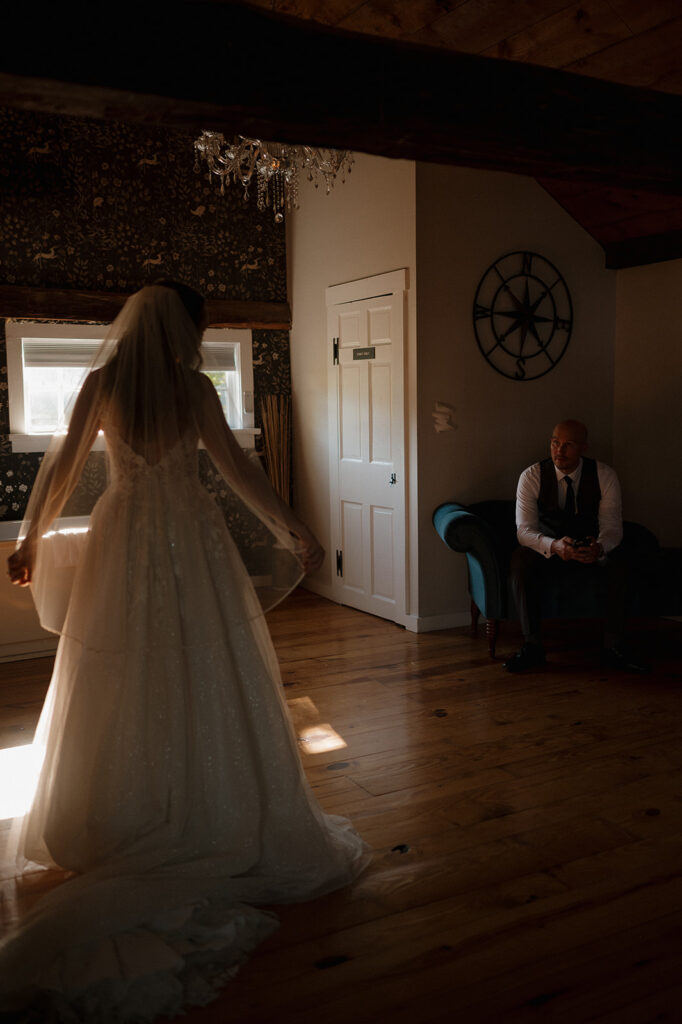 Bride and groom sitting inside together