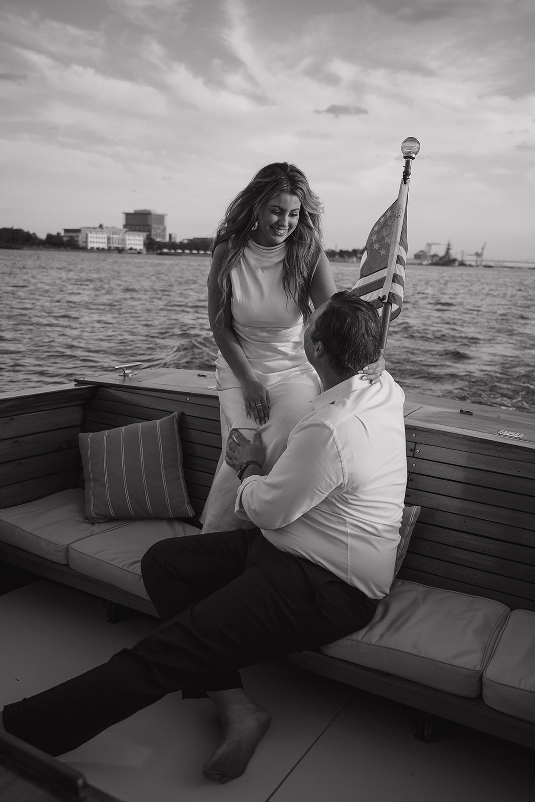 Black and white photo of a couples boat engagement session in Philly