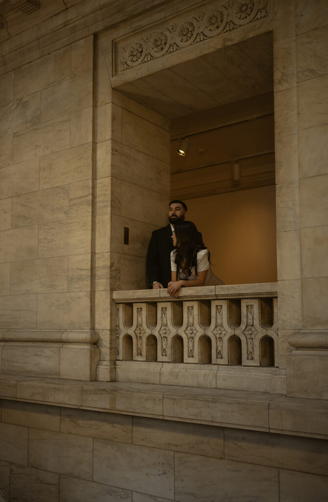 Couple posing at the NY Public Library.