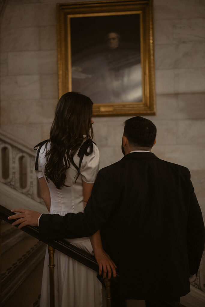Couple admiring art at The New York Public Library.