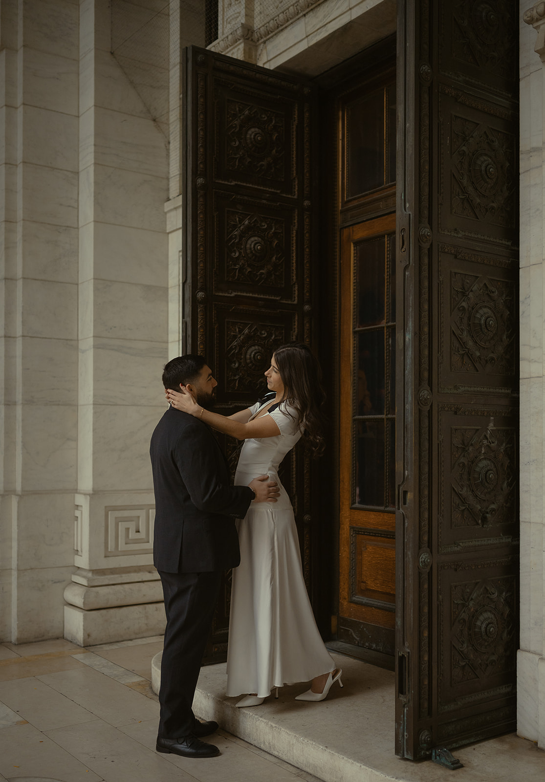 Couple posing for their romantic New York engagement photos. 