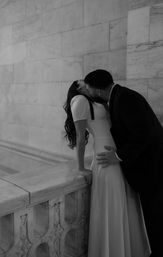 Black and white photo of a couple kissing during their NY engagement photos.