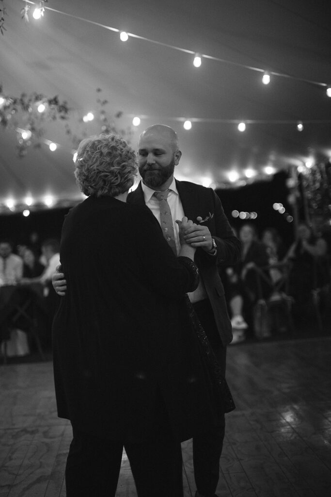 Groom dancing with his mother.