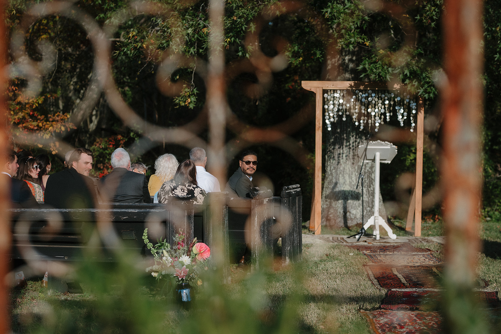 Cinematic wedding photo from an outdoor ceremony. 