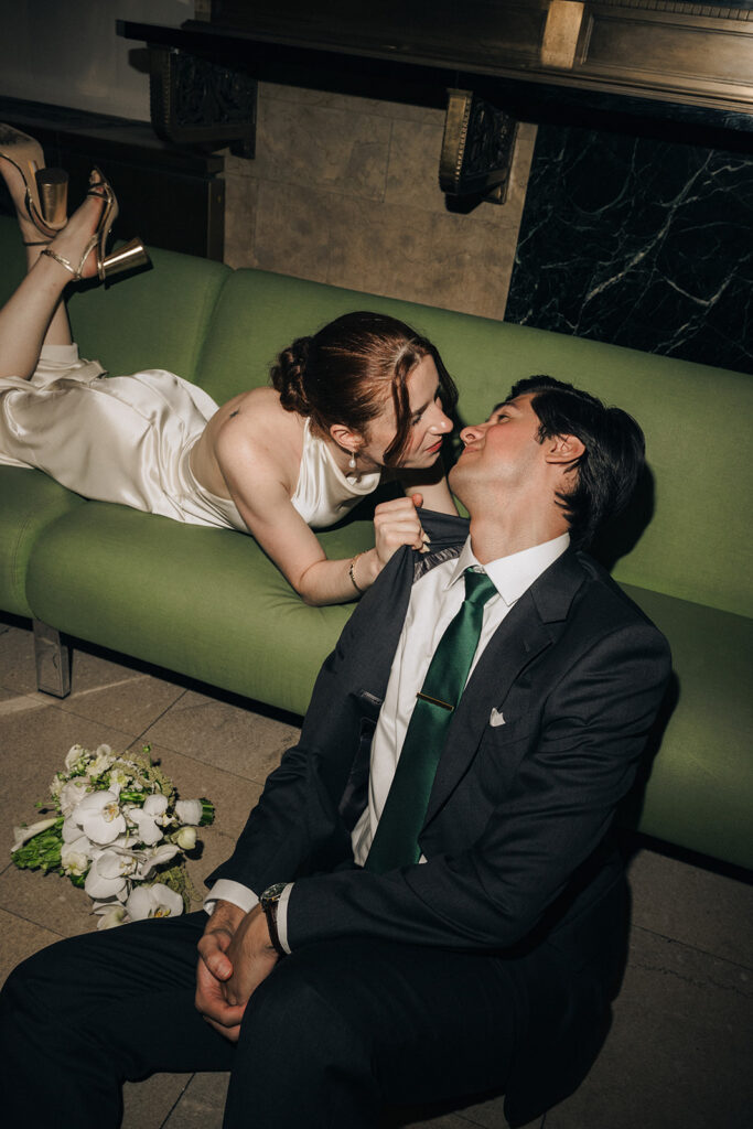 Couple waiting in the NYC City Hall lobby for their elopement.