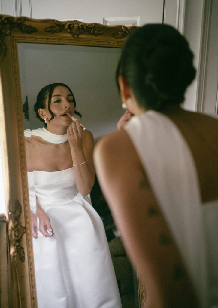 Bride getting ready in the bridal room at Appleford Estate in Villanova, PA