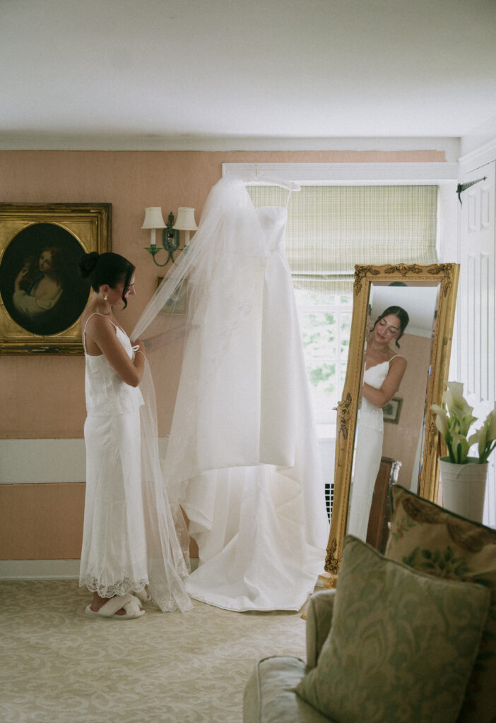 Bride getting ready in the bridal room at Appleford Estate in Villanova, PA